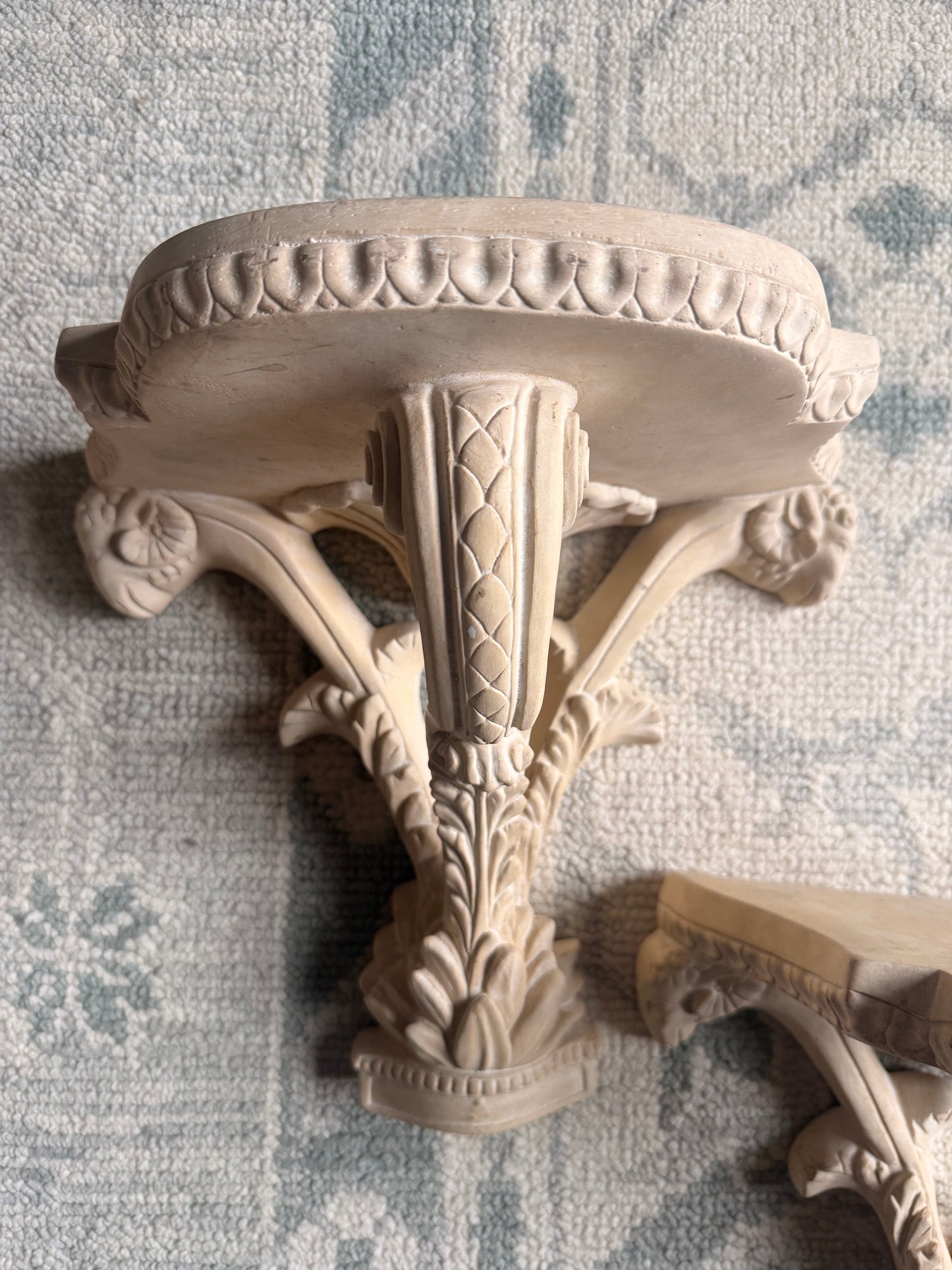 Pair of Unglazed Ceramic Wall Sconces with Rams Heads