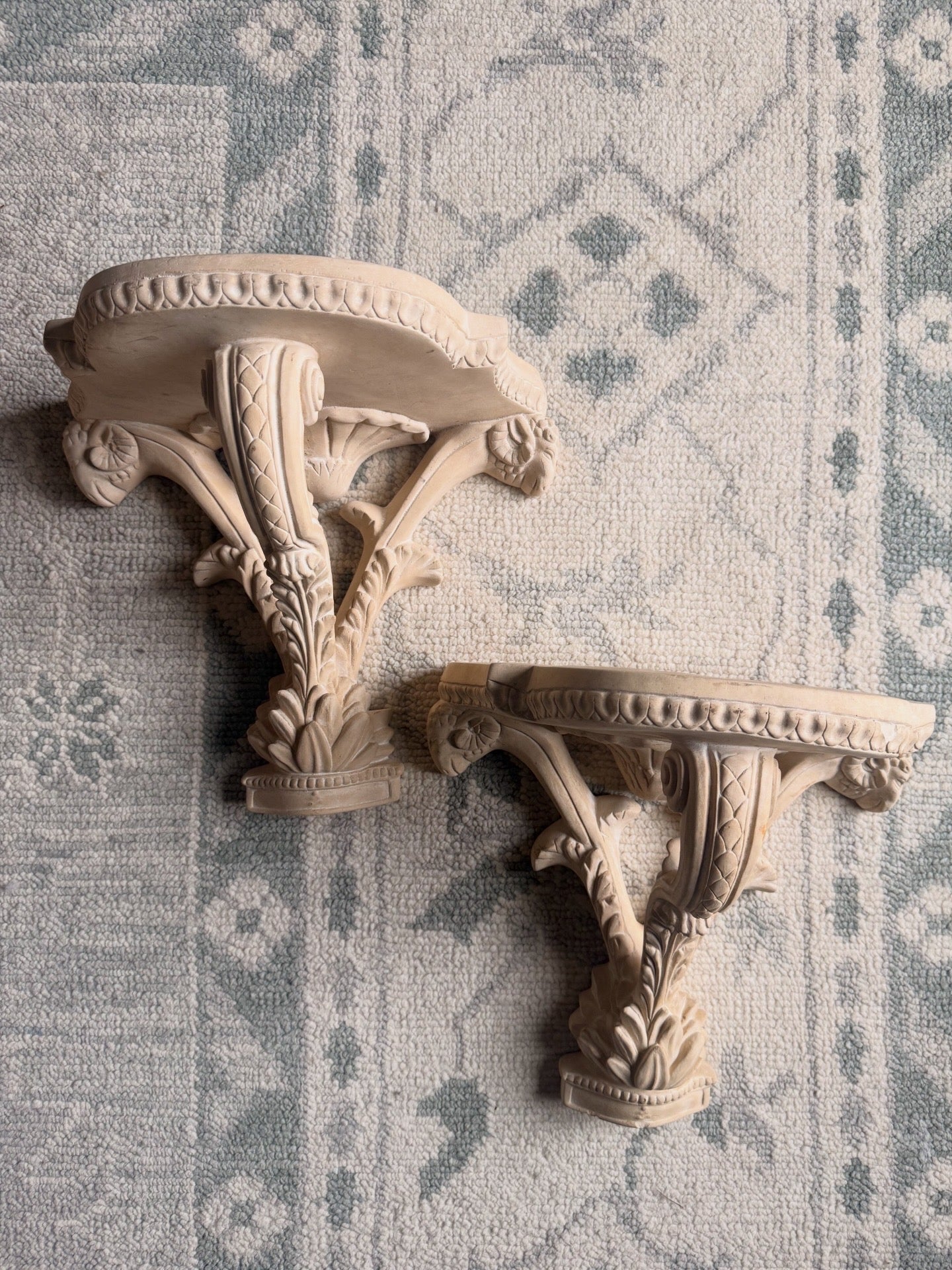 Pair of Unglazed Ceramic Wall Sconces with Rams Heads
