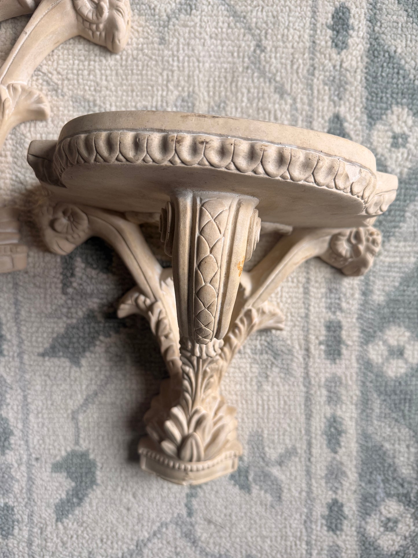 Pair of Unglazed Ceramic Wall Sconces with Rams Heads