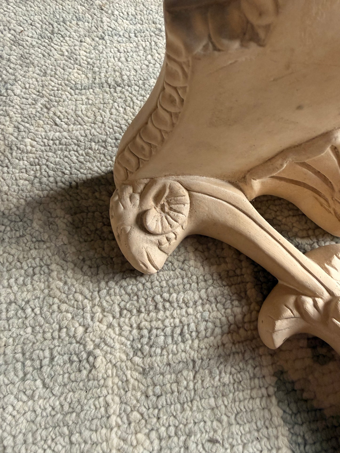 Pair of Unglazed Ceramic Wall Sconces with Rams Heads
